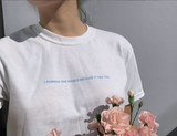 white 'I forgive the world because it has you' t-shirt